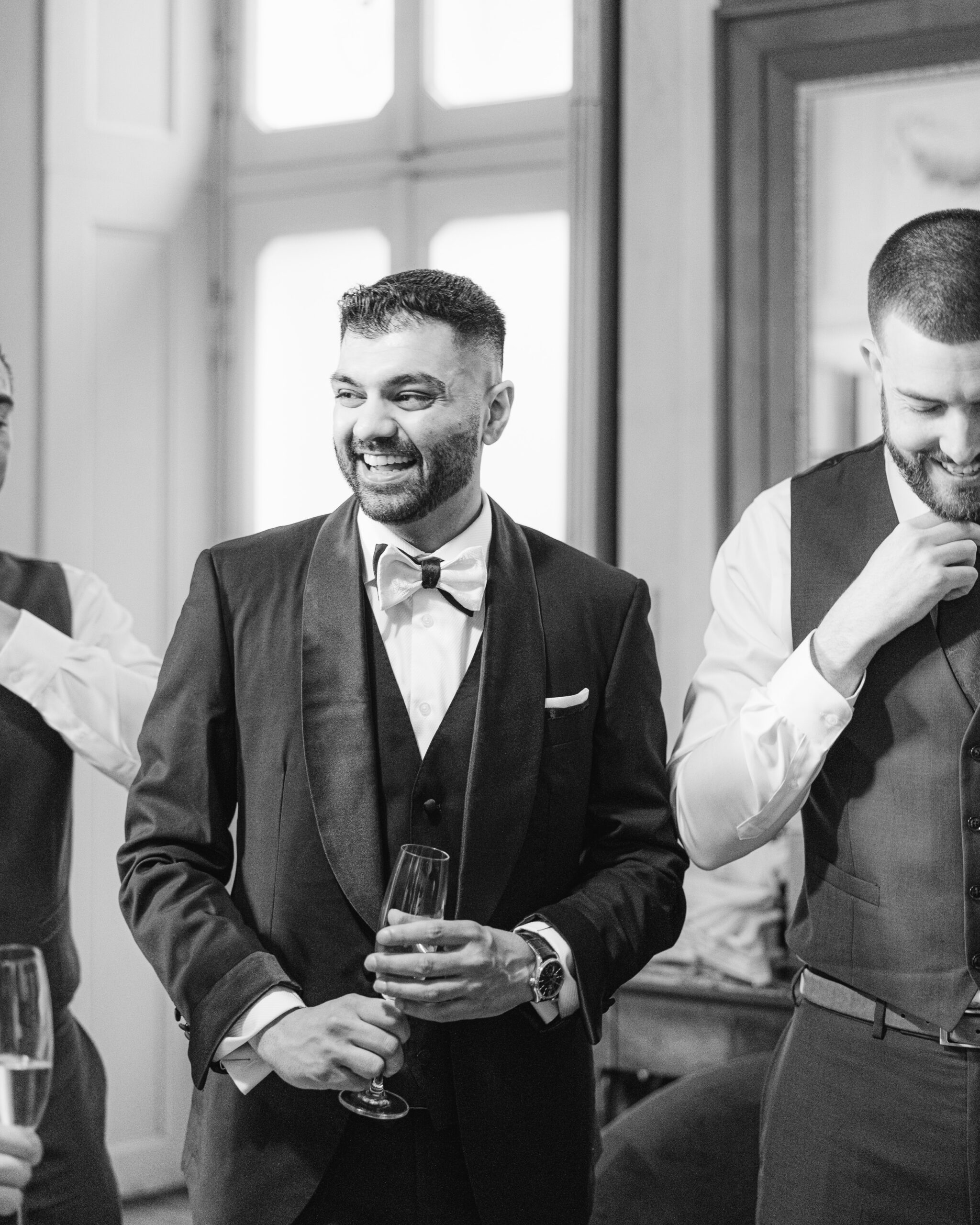 Groom in black tie for destination wedding on Lake Como