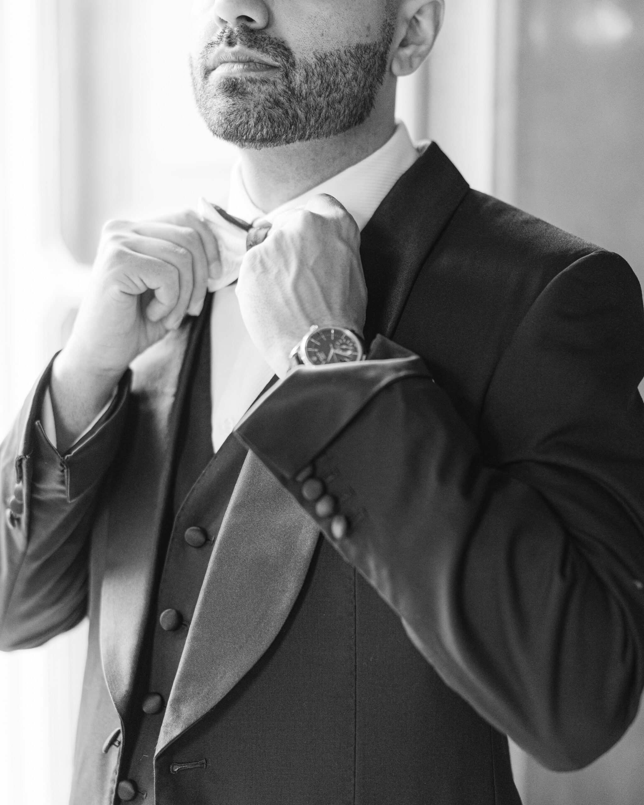 Groom in black tie for destination wedding on Lake Como