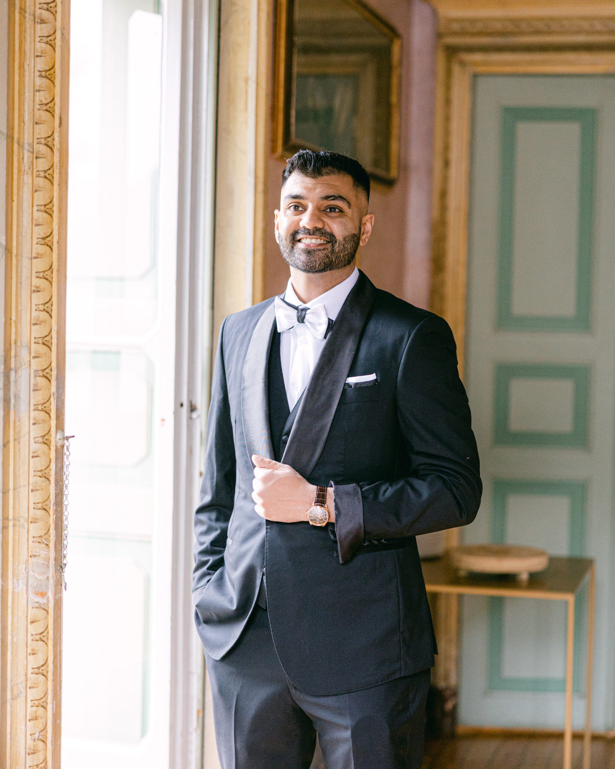 Groom in black tie for destination wedding on Lake Como