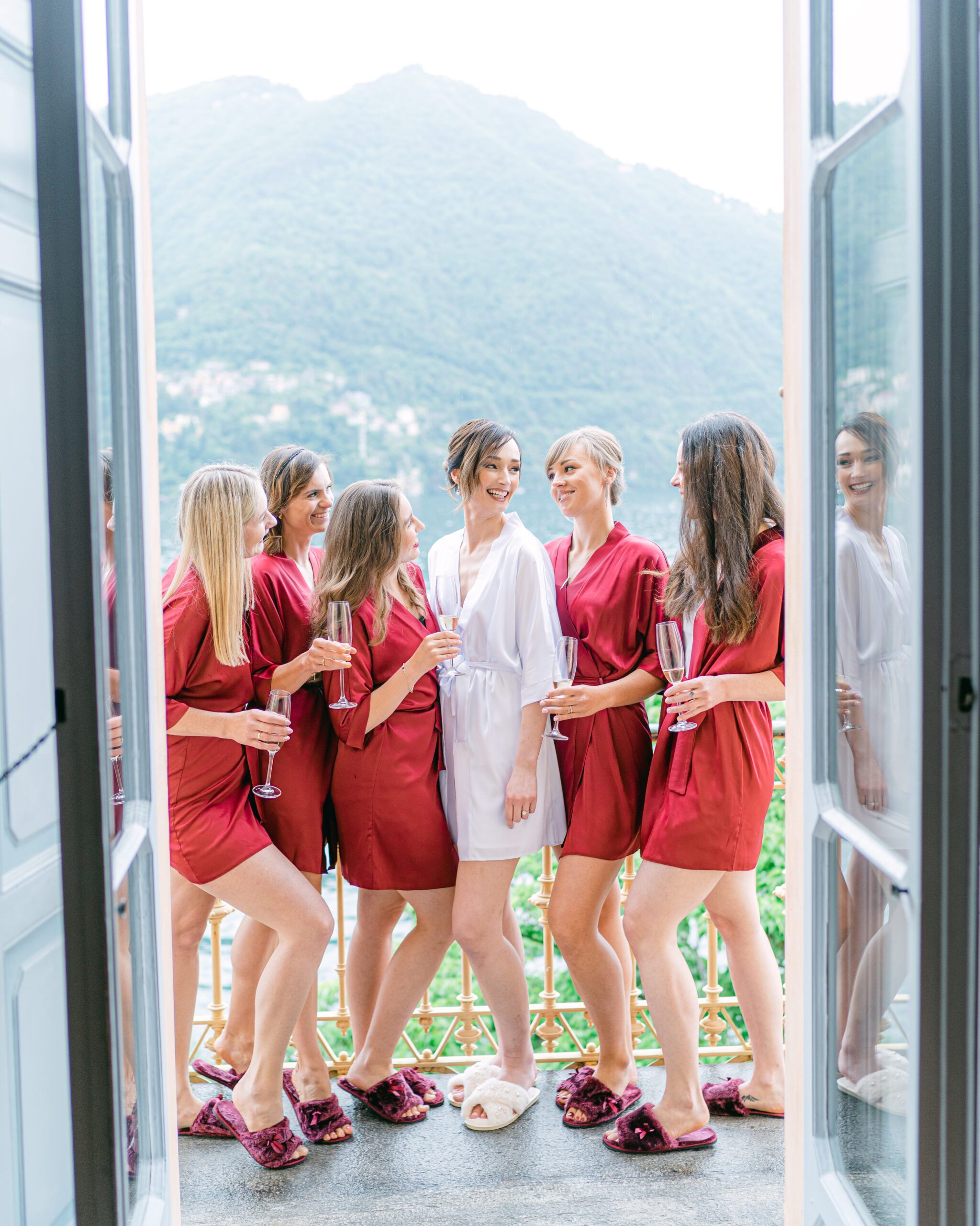 Bride and bridesmaids in gowns at Villa Pizzo on Lake Como