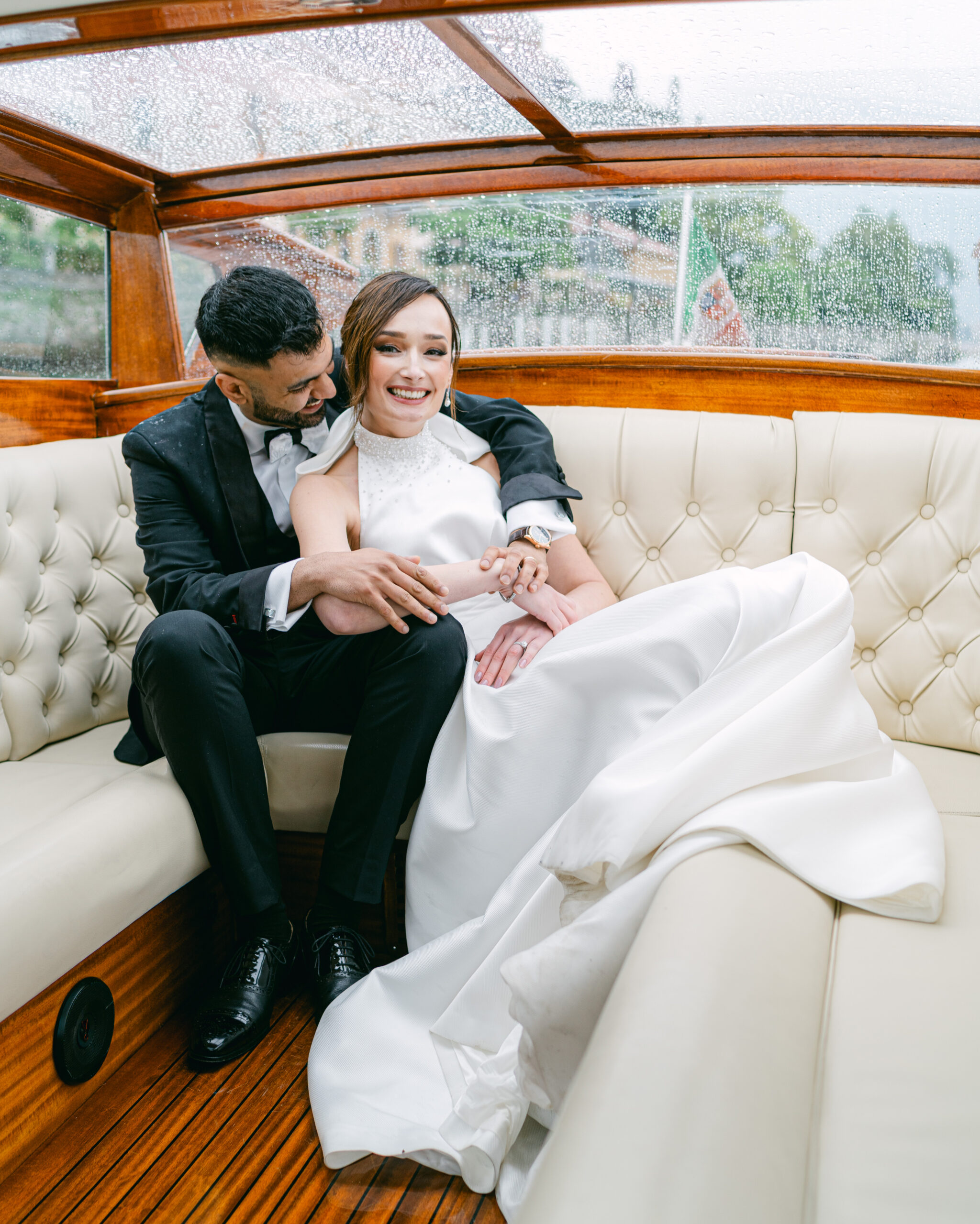 Wedding portraits on boat on Lake Como