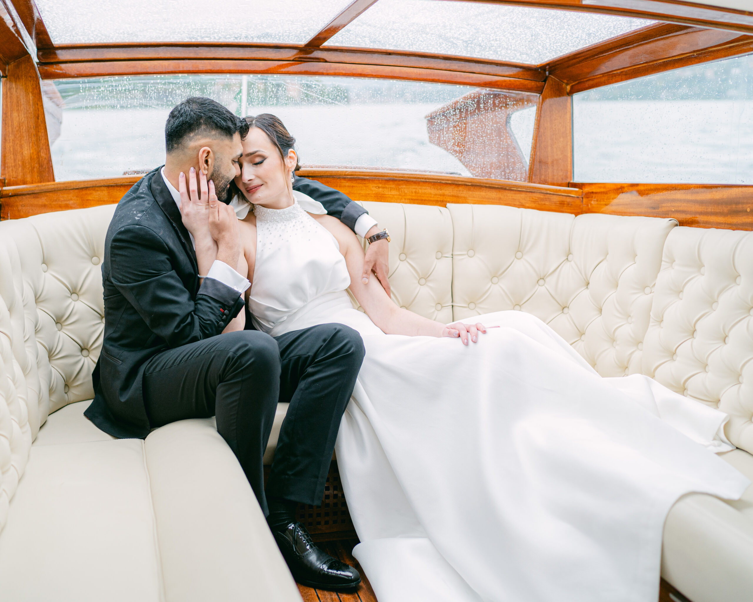 Wedding portraits on boat on Lake Como